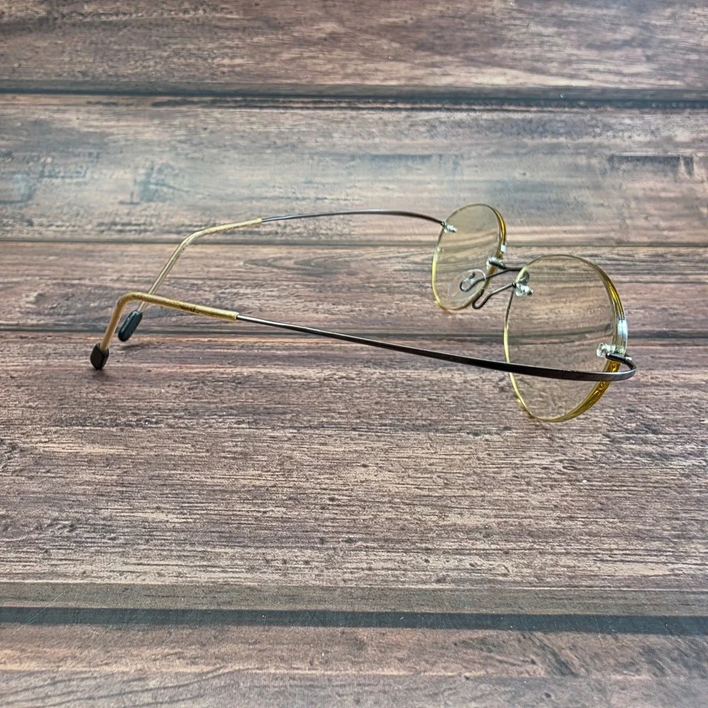 Marchon Airlock 2 720 Rimless Oval Eyeglasses Brown Gold 140mm Frames